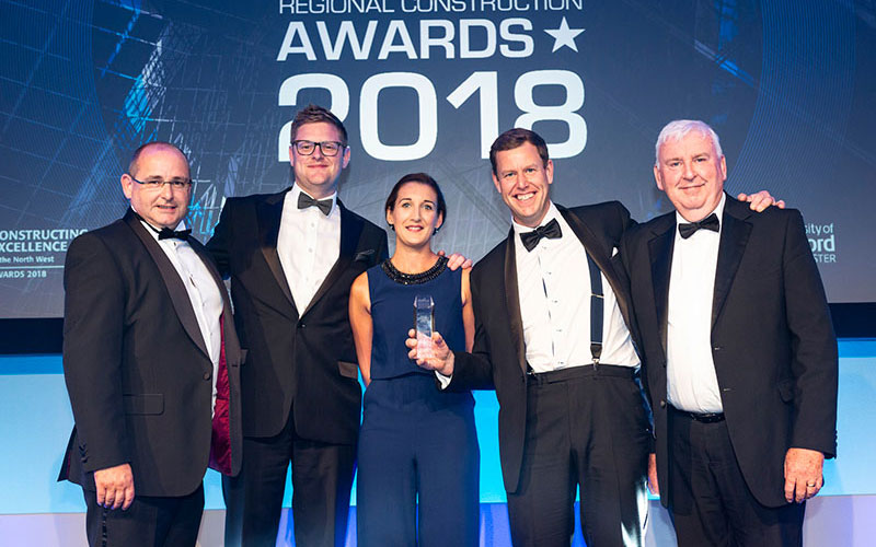 Pictured left to right are MC Construction directors Eugene O’Callaghan, Russ Forshaw, Michelle Richardson and David Lowe with Peter Commins, far right, north west managing director of category sponsor Kier Construction, who presented the award